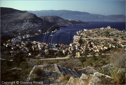 GREECE - (Dodecanese Island) - GRECIA (Dodecanneso) - ISOLA DI KASTELLORIZO (Megisti) - veduta del paese e del porto dalla montagna, sullo sfondo la costa turca