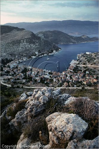 GREECE - (Dodecanese Island) - GRECIA (Dodecanneso) - ISOLA DI KASTELLORIZO (Megisti) - veduta del paese e del porto dalla montagna, sullo sfondo la costa turca
