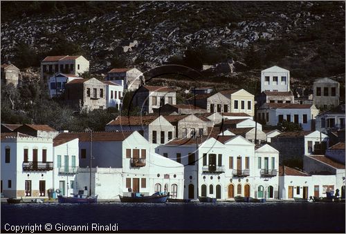 GREECE - (Dodecanese Island) - GRECIA (Dodecanneso) - ISOLA DI KASTELLORIZO (Megisti) - veduta delle tipiche casette del paese che si affacciano sullo specchio di mare del porto