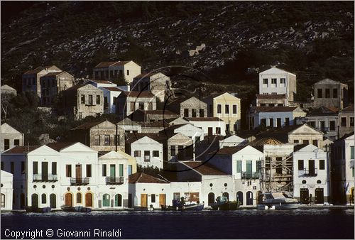 GREECE - (Dodecanese Island) - GRECIA (Dodecanneso) - ISOLA DI KASTELLORIZO (Megisti) - veduta delle tipiche casette del paese che si affacciano sullo specchio di mare del porto