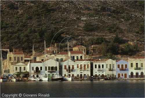 GREECE - (Dodecanese Island) - GRECIA (Dodecanneso) - ISOLA DI KASTELLORIZO (Megisti) - veduta delle tipiche casette del paese che si affacciano sullo specchio di mare del porto