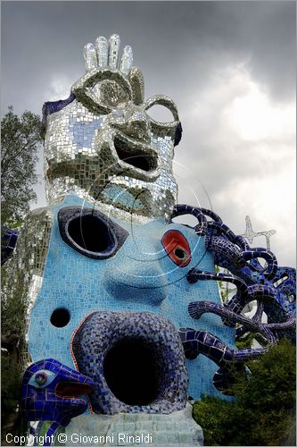 ITALY - Capalbio (GR) - localit Garavicchio - Il Giardino dei Tarocchi - opera originale e fantastica ideata dall'artista francese Niki de Saint Phalle. L'opera rappresenta i 22 Arcani Maggiori dei Tarocchi realizzati con fantastiche sculture di cemento armato e poliestere, ricoperte con mosaico di ceramica , vetri e specchi