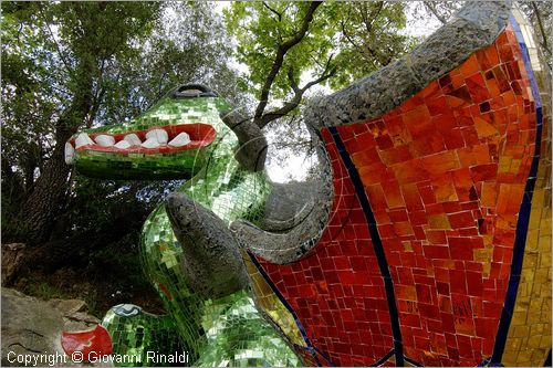 ITALY - Capalbio (GR) - localit Garavicchio - Il Giardino dei Tarocchi - opera originale e fantastica ideata dall'artista francese Niki de Saint Phalle. L'opera rappresenta i 22 Arcani Maggiori dei Tarocchi realizzati con fantastiche sculture di cemento armato e poliestere, ricoperte con mosaico di ceramica , vetri e specchi