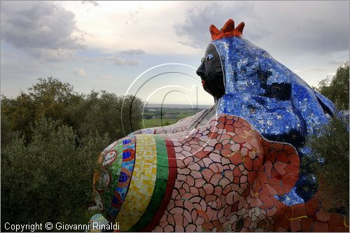 ITALY - Capalbio (GR) - localit Garavicchio - Il Giardino dei Tarocchi - opera originale e fantastica ideata dall'artista francese Niki de Saint Phalle. L'opera rappresenta i 22 Arcani Maggiori dei Tarocchi realizzati con fantastiche sculture di cemento armato e poliestere, ricoperte con mosaico di ceramica , vetri e specchi