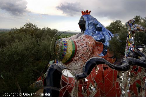 ITALY - Capalbio (GR) - localit Garavicchio - Il Giardino dei Tarocchi - opera originale e fantastica ideata dall'artista francese Niki de Saint Phalle. L'opera rappresenta i 22 Arcani Maggiori dei Tarocchi realizzati con fantastiche sculture di cemento armato e poliestere, ricoperte con mosaico di ceramica , vetri e specchi