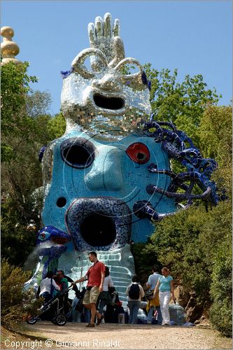 ITALY - Capalbio (GR) - localit Garavicchio - Il Giardino dei Tarocchi - opera originale e fantastica ideata dall'artista francese Niki de Saint Phalle. L'opera rappresenta i 22 Arcani Maggiori dei Tarocchi realizzati con fantastiche sculture di cemento armato e poliestere, ricoperte con mosaico di ceramica , vetri e specchi