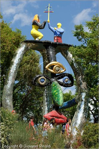 ITALY - Capalbio (GR) - localit Garavicchio - Il Giardino dei Tarocchi - opera originale e fantastica ideata dall'artista francese Niki de Saint Phalle. L'opera rappresenta i 22 Arcani Maggiori dei Tarocchi realizzati con fantastiche sculture di cemento armato e poliestere, ricoperte con mosaico di ceramica , vetri e specchi