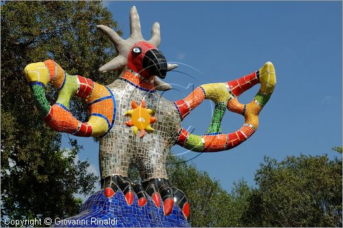 ITALY - Capalbio (GR) - localit Garavicchio - Il Giardino dei Tarocchi - opera originale e fantastica ideata dall'artista francese Niki de Saint Phalle. L'opera rappresenta i 22 Arcani Maggiori dei Tarocchi realizzati con fantastiche sculture di cemento armato e poliestere, ricoperte con mosaico di ceramica , vetri e specchi