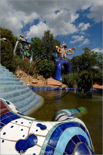 ITALY - Capalbio (GR) - localit Garavicchio - Il Giardino dei Tarocchi - opera originale e fantastica ideata dall'artista francese Niki de Saint Phalle. L'opera rappresenta i 22 Arcani Maggiori dei Tarocchi realizzati con fantastiche sculture di cemento armato e poliestere, ricoperte con mosaico di ceramica , vetri e specchi