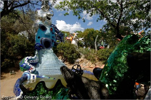 ITALY - Capalbio (GR) - localit Garavicchio - Il Giardino dei Tarocchi - opera originale e fantastica ideata dall'artista francese Niki de Saint Phalle. L'opera rappresenta i 22 Arcani Maggiori dei Tarocchi realizzati con fantastiche sculture di cemento armato e poliestere, ricoperte con mosaico di ceramica , vetri e specchi