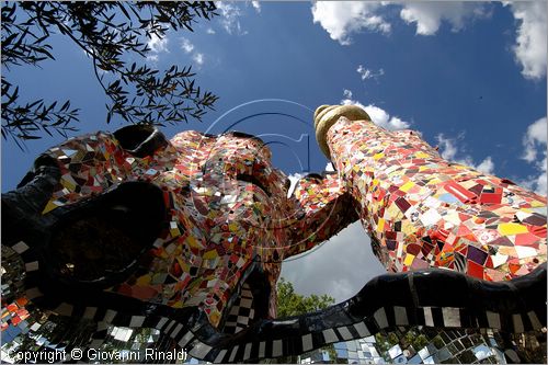 ITALY - Capalbio (GR) - localit Garavicchio - Il Giardino dei Tarocchi - opera originale e fantastica ideata dall'artista francese Niki de Saint Phalle. L'opera rappresenta i 22 Arcani Maggiori dei Tarocchi realizzati con fantastiche sculture di cemento armato e poliestere, ricoperte con mosaico di ceramica , vetri e specchi