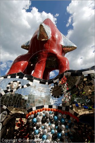 ITALY - Capalbio (GR) - localit Garavicchio - Il Giardino dei Tarocchi - opera originale e fantastica ideata dall'artista francese Niki de Saint Phalle. L'opera rappresenta i 22 Arcani Maggiori dei Tarocchi realizzati con fantastiche sculture di cemento armato e poliestere, ricoperte con mosaico di ceramica , vetri e specchi