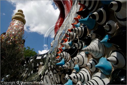 ITALY - Capalbio (GR) - localit Garavicchio - Il Giardino dei Tarocchi - opera originale e fantastica ideata dall'artista francese Niki de Saint Phalle. L'opera rappresenta i 22 Arcani Maggiori dei Tarocchi realizzati con fantastiche sculture di cemento armato e poliestere, ricoperte con mosaico di ceramica , vetri e specchi