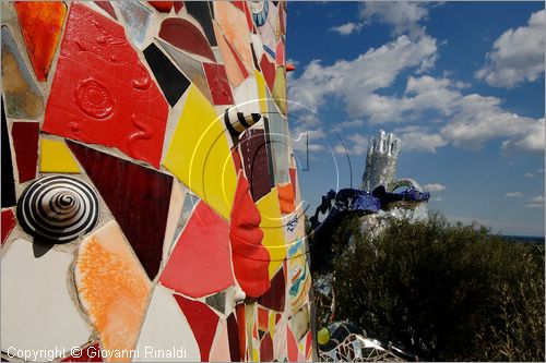 ITALY - Capalbio (GR) - localit Garavicchio - Il Giardino dei Tarocchi - opera originale e fantastica ideata dall'artista francese Niki de Saint Phalle. L'opera rappresenta i 22 Arcani Maggiori dei Tarocchi realizzati con fantastiche sculture di cemento armato e poliestere, ricoperte con mosaico di ceramica , vetri e specchi