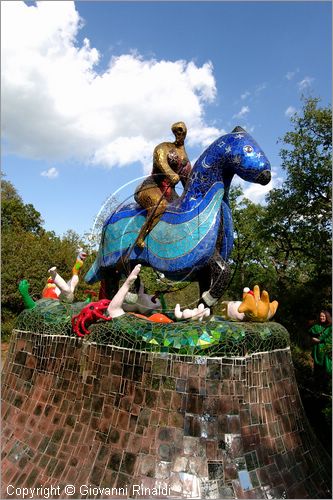 ITALY - Capalbio (GR) - localit Garavicchio - Il Giardino dei Tarocchi - opera originale e fantastica ideata dall'artista francese Niki de Saint Phalle. L'opera rappresenta i 22 Arcani Maggiori dei Tarocchi realizzati con fantastiche sculture di cemento armato e poliestere, ricoperte con mosaico di ceramica , vetri e specchi