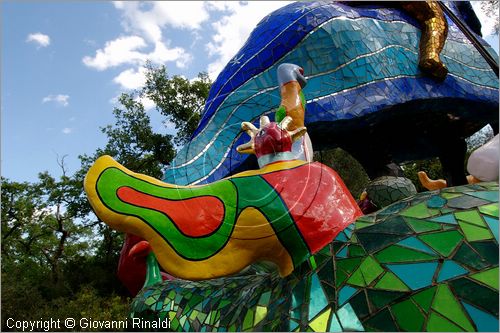 ITALY - Capalbio (GR) - localit Garavicchio - Il Giardino dei Tarocchi - opera originale e fantastica ideata dall'artista francese Niki de Saint Phalle. L'opera rappresenta i 22 Arcani Maggiori dei Tarocchi realizzati con fantastiche sculture di cemento armato e poliestere, ricoperte con mosaico di ceramica , vetri e specchi