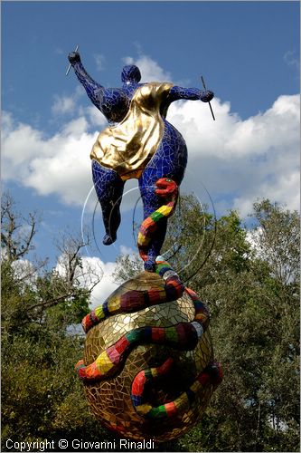 ITALY - Capalbio (GR) - località Garavicchio - Il Giardino dei Tarocchi - opera originale e fantastica ideata dall'artista francese Niki de Saint Phalle. L'opera rappresenta i 22 Arcani Maggiori dei Tarocchi realizzati con fantastiche sculture di cemento armato e poliestere, ricoperte con mosaico di ceramica , vetri e specchi