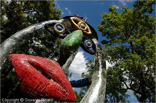 ITALY - Capalbio (GR) - localit Garavicchio - Il Giardino dei Tarocchi - opera originale e fantastica ideata dall'artista francese Niki de Saint Phalle. L'opera rappresenta i 22 Arcani Maggiori dei Tarocchi realizzati con fantastiche sculture di cemento armato e poliestere, ricoperte con mosaico di ceramica , vetri e specchi