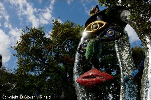 ITALY - Capalbio (GR) - localit Garavicchio - Il Giardino dei Tarocchi - opera originale e fantastica ideata dall'artista francese Niki de Saint Phalle. L'opera rappresenta i 22 Arcani Maggiori dei Tarocchi realizzati con fantastiche sculture di cemento armato e poliestere, ricoperte con mosaico di ceramica , vetri e specchi