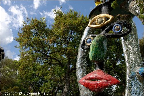 ITALY - Capalbio (GR) - localit Garavicchio - Il Giardino dei Tarocchi - opera originale e fantastica ideata dall'artista francese Niki de Saint Phalle. L'opera rappresenta i 22 Arcani Maggiori dei Tarocchi realizzati con fantastiche sculture di cemento armato e poliestere, ricoperte con mosaico di ceramica , vetri e specchi