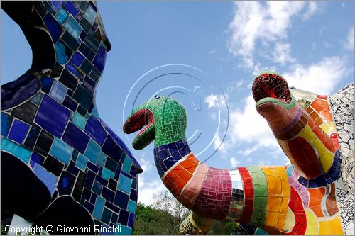 ITALY - Capalbio (GR) - localit Garavicchio - Il Giardino dei Tarocchi - opera originale e fantastica ideata dall'artista francese Niki de Saint Phalle. L'opera rappresenta i 22 Arcani Maggiori dei Tarocchi realizzati con fantastiche sculture di cemento armato e poliestere, ricoperte con mosaico di ceramica , vetri e specchi