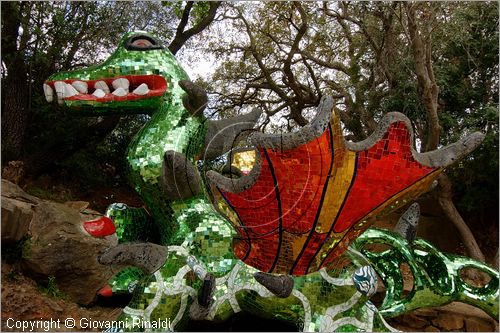 ITALY - Capalbio (GR) - localit Garavicchio - Il Giardino dei Tarocchi - opera originale e fantastica ideata dall'artista francese Niki de Saint Phalle. L'opera rappresenta i 22 Arcani Maggiori dei Tarocchi realizzati con fantastiche sculture di cemento armato e poliestere, ricoperte con mosaico di ceramica , vetri e specchi