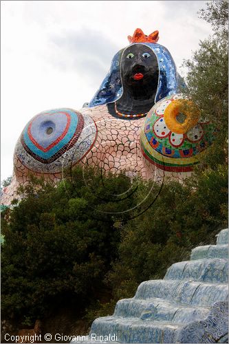 ITALY - Capalbio (GR) - localit Garavicchio - Il Giardino dei Tarocchi - opera originale e fantastica ideata dall'artista francese Niki de Saint Phalle. L'opera rappresenta i 22 Arcani Maggiori dei Tarocchi realizzati con fantastiche sculture di cemento armato e poliestere, ricoperte con mosaico di ceramica , vetri e specchi