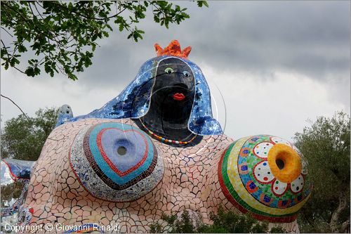 ITALY - Capalbio (GR) - localit Garavicchio - Il Giardino dei Tarocchi - opera originale e fantastica ideata dall'artista francese Niki de Saint Phalle. L'opera rappresenta i 22 Arcani Maggiori dei Tarocchi realizzati con fantastiche sculture di cemento armato e poliestere, ricoperte con mosaico di ceramica , vetri e specchi