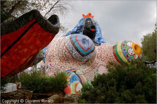 ITALY - Capalbio (GR) - localit Garavicchio - Il Giardino dei Tarocchi - opera originale e fantastica ideata dall'artista francese Niki de Saint Phalle. L'opera rappresenta i 22 Arcani Maggiori dei Tarocchi realizzati con fantastiche sculture di cemento armato e poliestere, ricoperte con mosaico di ceramica , vetri e specchi