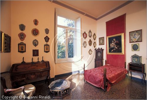 ITALY - NERVI (GE) - Museo Giannettino Luxoro - la stanza da letto, con acquasantiere in ceramica e in argento