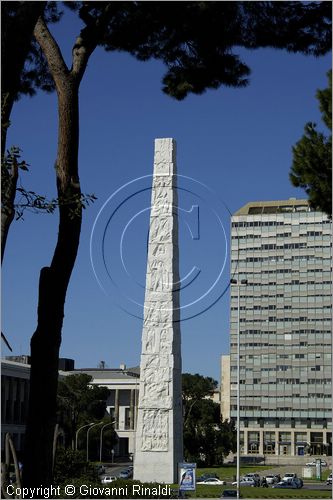 ITALY - ROMA - EUR - Piazza G. Marconi con la stele ideata da Arturo Dazi che celebra con 92 rilievi l'invenzione della radio