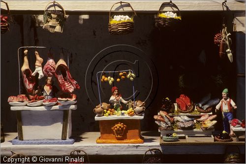 ITALY - NAPOLI - Via di San Gregorio Armeno con gli artigiani che vendono i presepi durante il natale