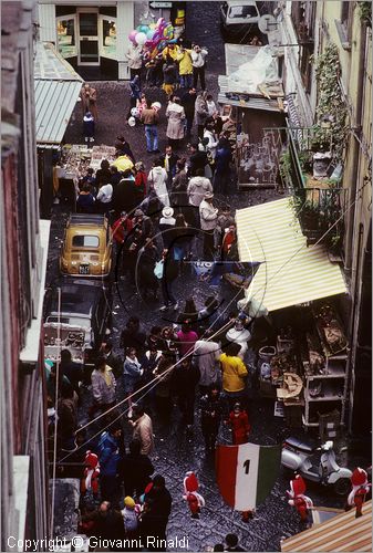 ITALY - NAPOLI - Via di San Gregorio Armeno con gli artigiani che vendono i presepi durante il natale